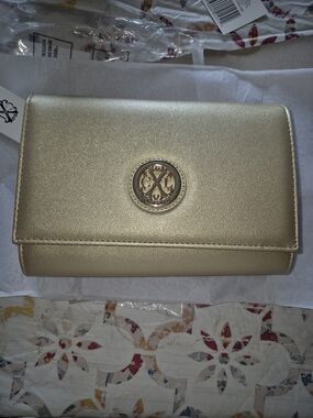 Christian Lacroix Metallic Gold Clutch with Signature Medallion